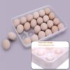 Plastic egg container with 24 sections and a lid, perfect for organizing 2 dozen eggs in the fridge