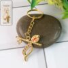 Flute and Peacock Feather Krishna Design Keychain (1 Pc) Flute and Peacock Feather Krishna Design Keychain (1 Pc)