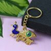 Krishna Peacock Design Golden Keychain (1 Pc) Krishna Peacock Design Golden Keychain (1 Pc)