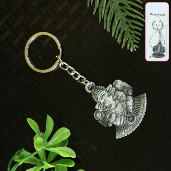 Lord Ganesha Sitting Design Silver Keychain (1 Pc) Lord Ganesha Sitting Design Silver Keychain (1 Pc)