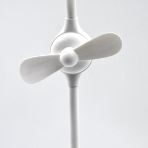 LED desk lamp with USB cable, fan and pen holder for various uses.